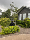 3 tier quarter horse fountain with round acorn and traditional pond