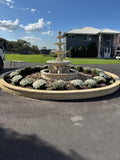 4 tier Quarter horse fountain with traditional acorn and traditional pond surround