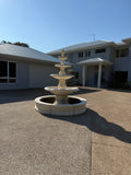 4 tier Italian fountain with traditional acorn and traditional pond surround