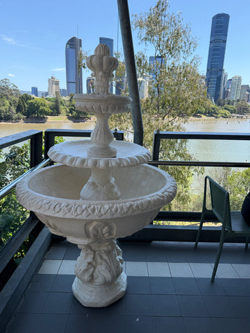 3 tier fancy fountain with traditional acorn fountain