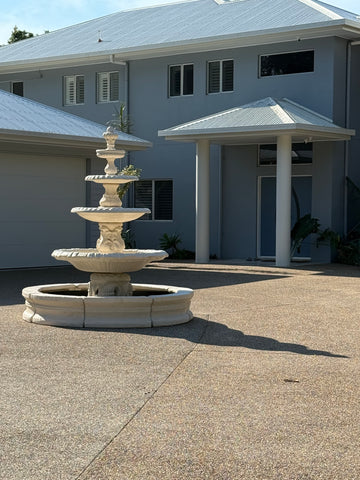 4 tier Italian fountain with traditional acorn and traditional pond surround