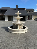 3 tier quarter horse fountain with round acorn and traditional pond surround
