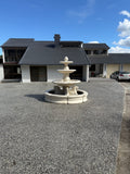 3 tier quarter horse fountain with round acorn and traditional pond surround