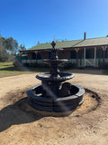 3 tier quarter horse fountain with traditional acorn and traditional pond surround