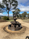 3 tier quarter horse fountain with traditional acorn and traditional pond surround