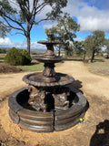 3 tier quarter horse fountain with traditional acorn and traditional pond surround