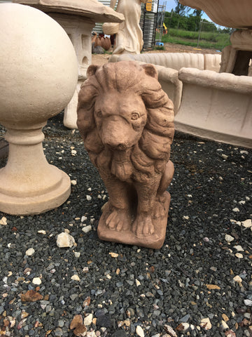 Small standing lion statue
