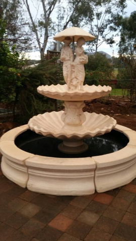2 tier scollup fountain with spring time and traditional pond