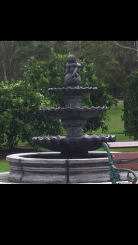 3 tier scollup fountain with cherub boy