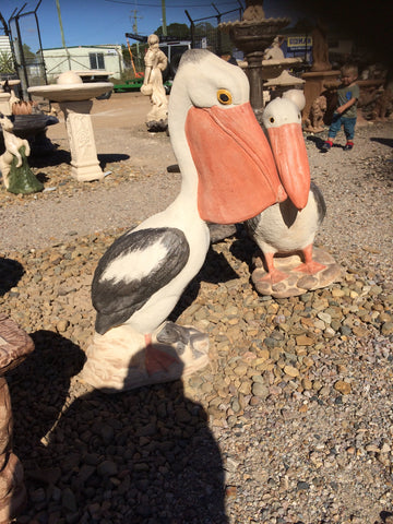 Large standing pelican statue