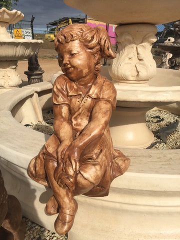 Sitting girl statue