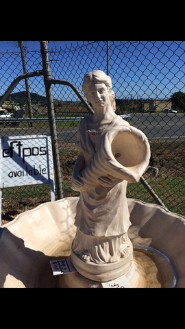 Woven basket pourer lady fountain statue