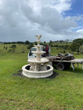 Quarter horse fountain with doves and traditional pond surround